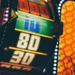 Closeup of a colorful roulette wheel in a casino.