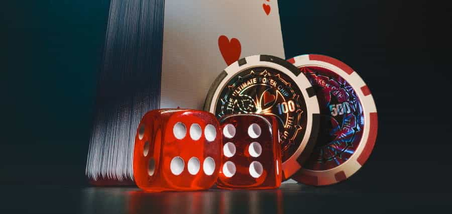 Poker chips, playing cards and dice.