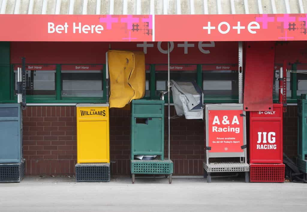 Bookmaker pitches stored before tote windows at Wolverhampton Racecourse.