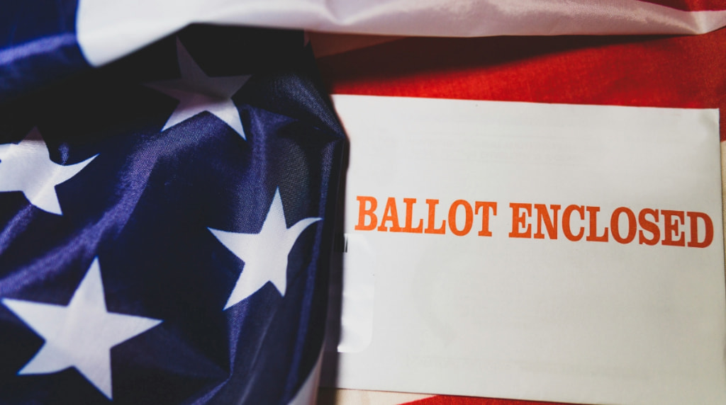 An enclosed ballot with the US flag